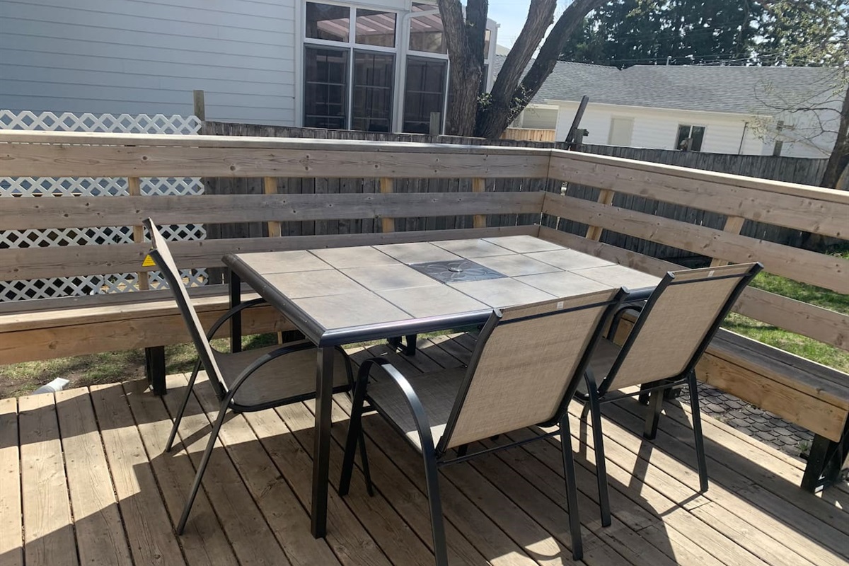 Enjoy the sun soaked deck off located through the patio doors from the kitchen - dining room area. 