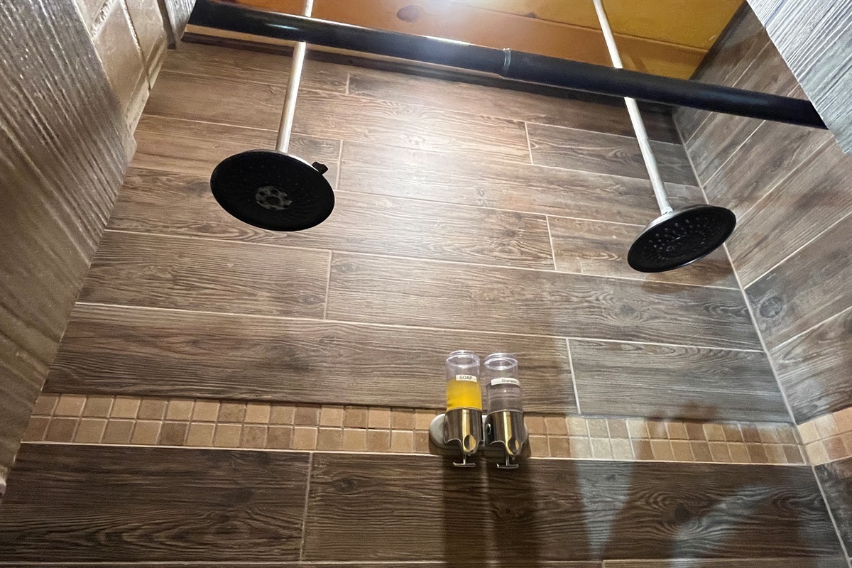 Dual shower heads. All showers are big enough for 2. Bring a friend.