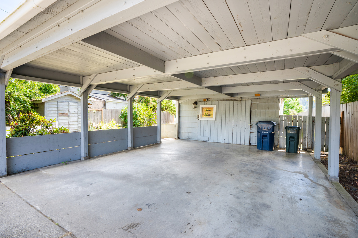The carport can accommodate multiple cars. 