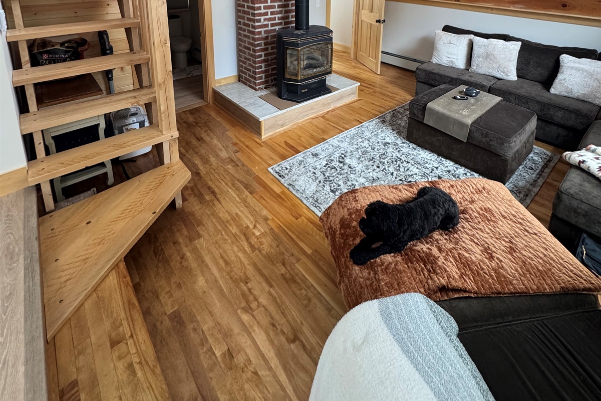 Experience the glow of Bethel Main, where soaring wood beams and a crackling fire set the scene for slow mornings.