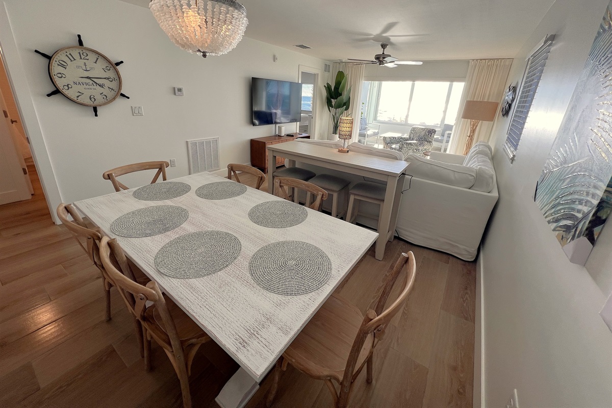Dining for six and view of the beach and Gulf