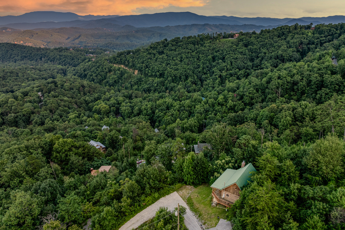 Tucked among the trees with sweeping mountain views all around