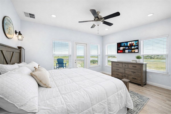 Upper Level King Suite (Alternate View): Wake up to coastal light in this private upstairs ensuite bedroom.