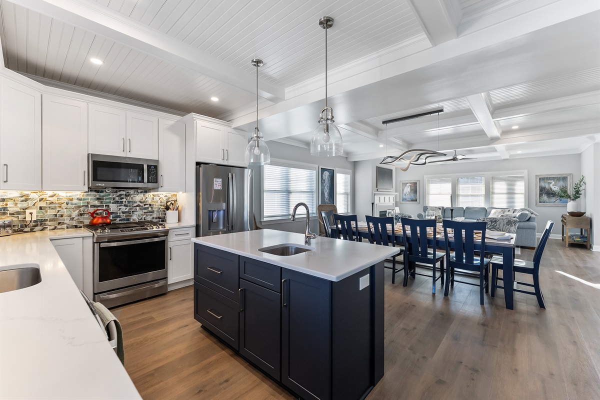 Large Kitchen With Island With View Of Large Dining Table