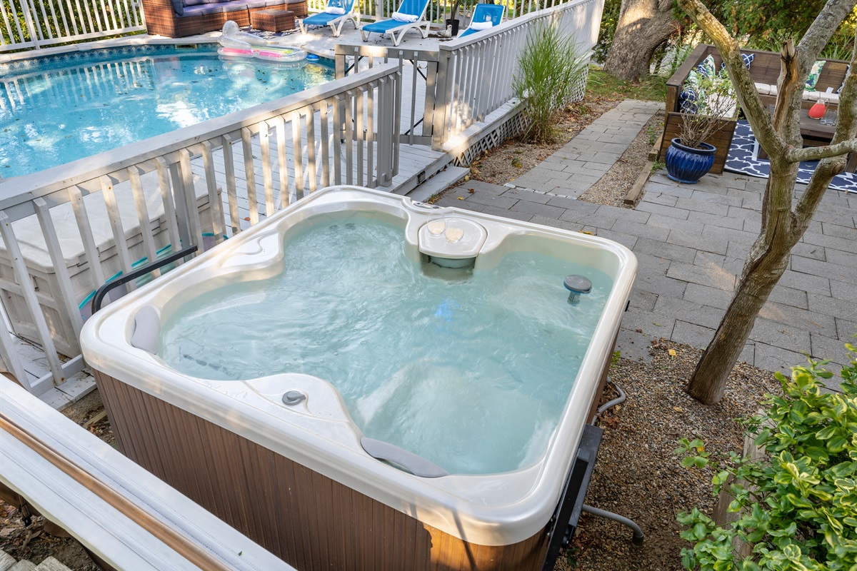 Escape to your backyard oasis with a luxurious hot tub, the ideal place to unwind and recharge.
