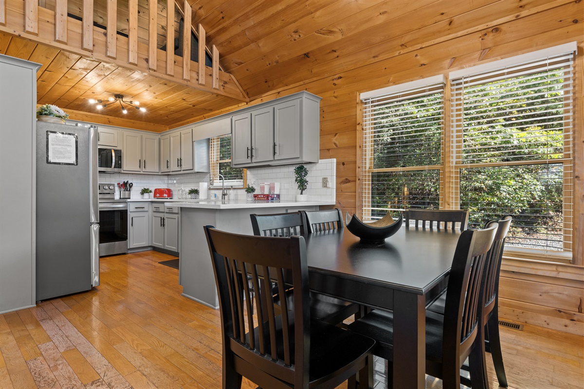The windows frame your dining table in green, a feast for the senses inside and out.