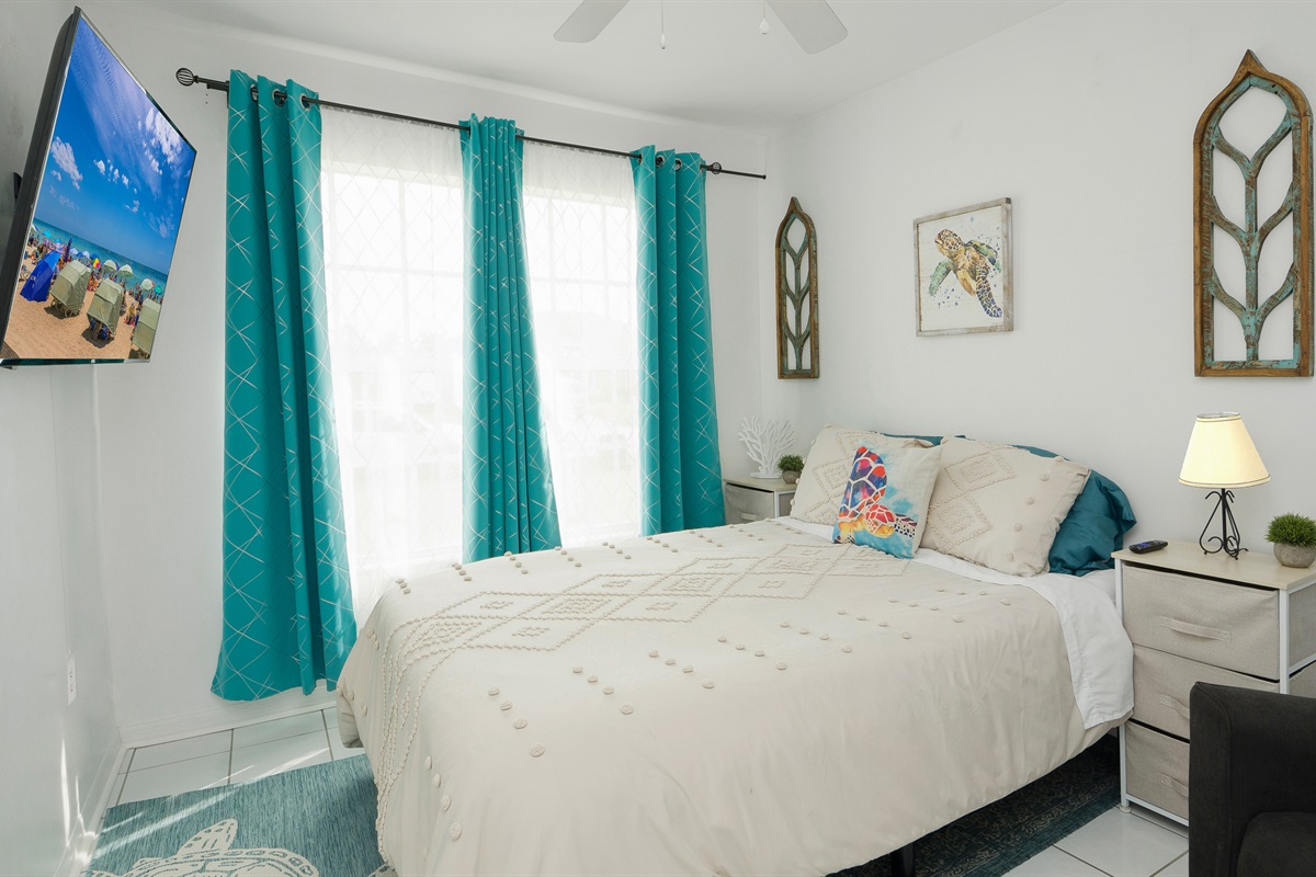 Queen-sized bed with Smart TV
