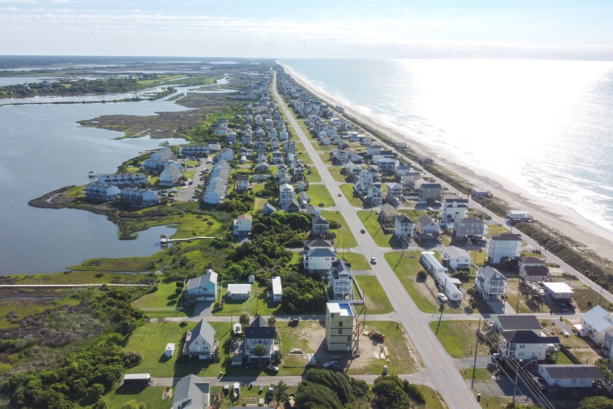 Coastal townhomes line Island Dr.
