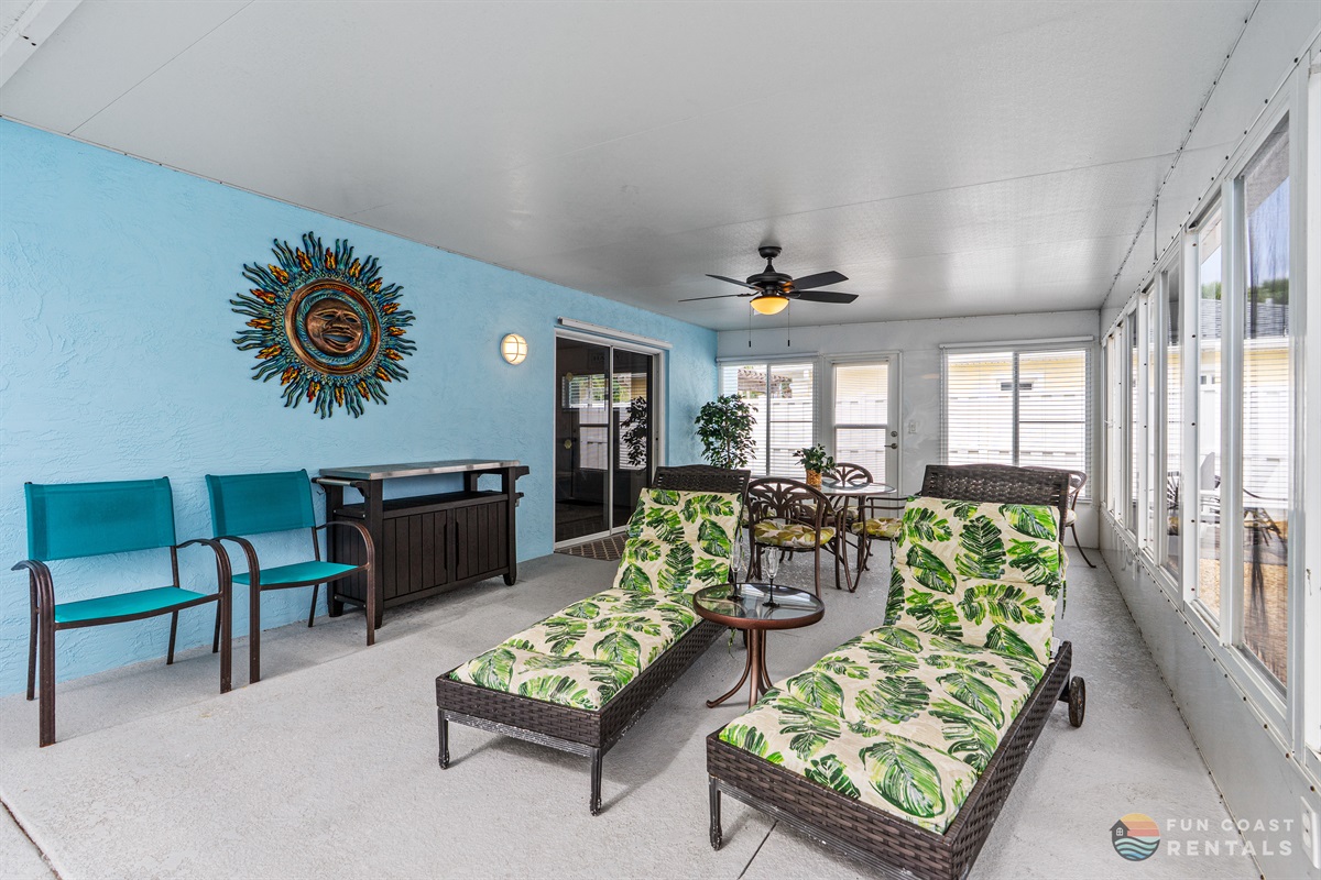 Poolside Patio with Outdoor Dining and Sun Loungers