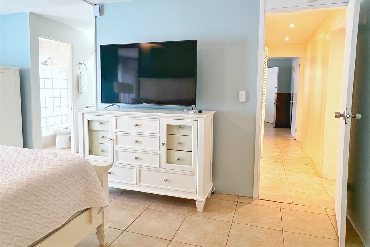 Each bedroom features elegant furnishings, plenty of storage, and private bathrooms.