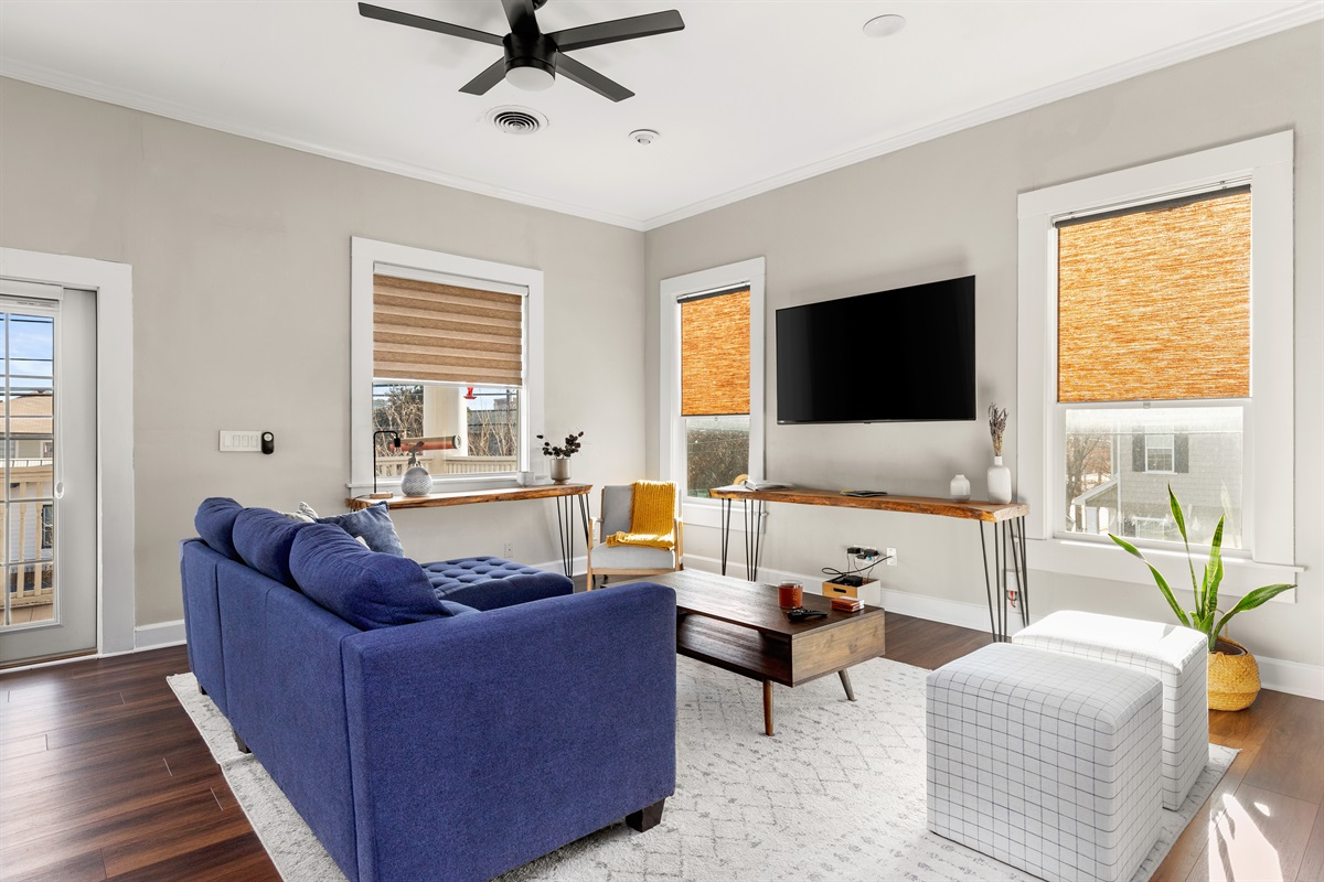 Home entertainment redefined: where the cozy embrace of the sofa meets the captivating glow of the TV, creating the perfect living room