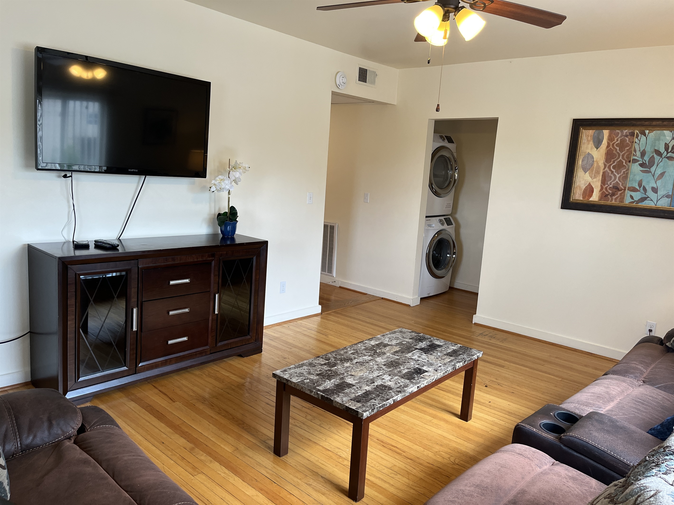 Living room with in unit laundry