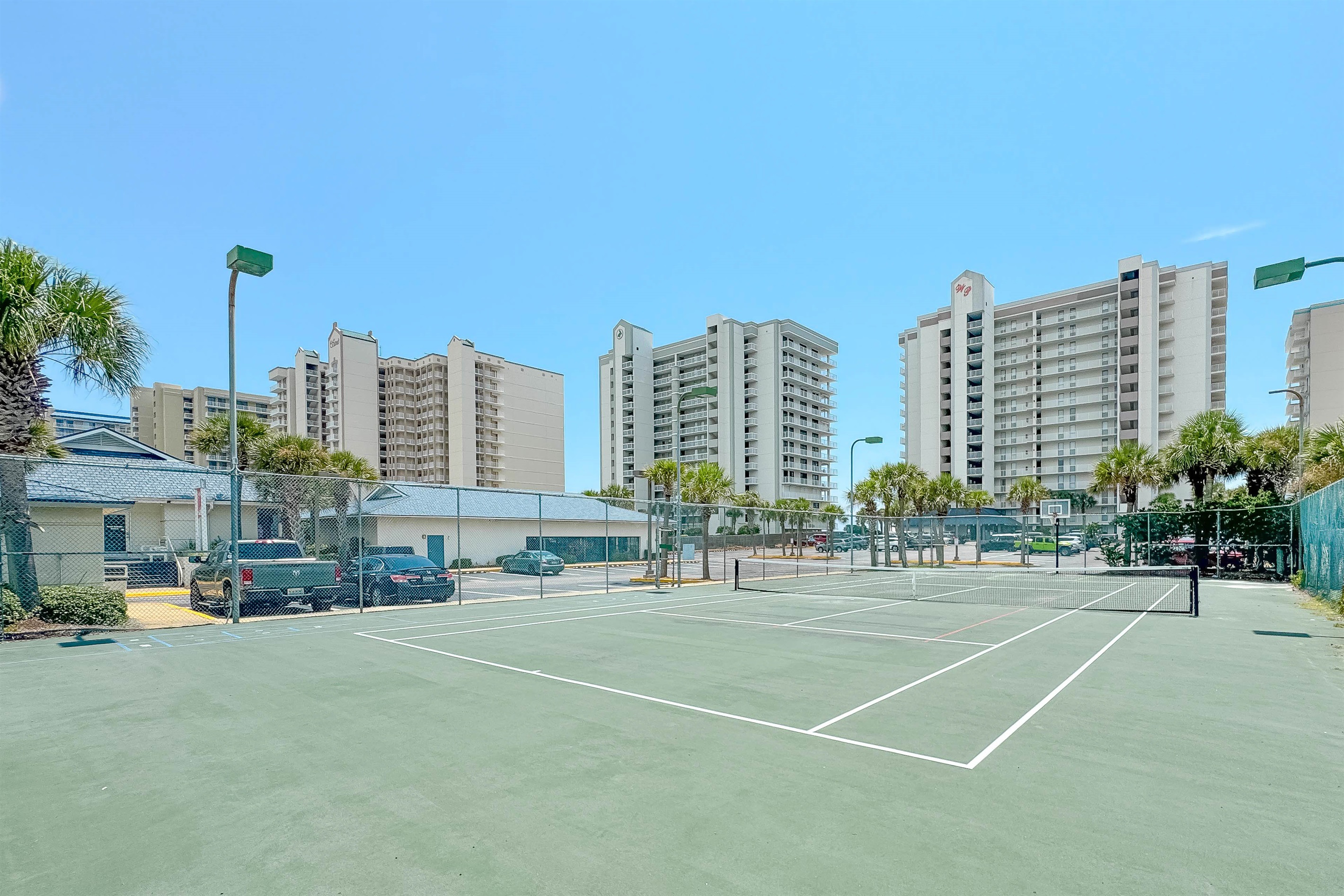 Ready for a match? Our on-site tennis court at Windward Pointe offers a great way to stay active and enjoy some friendly competition during your stay. Grab a racquet and hit the courts!
