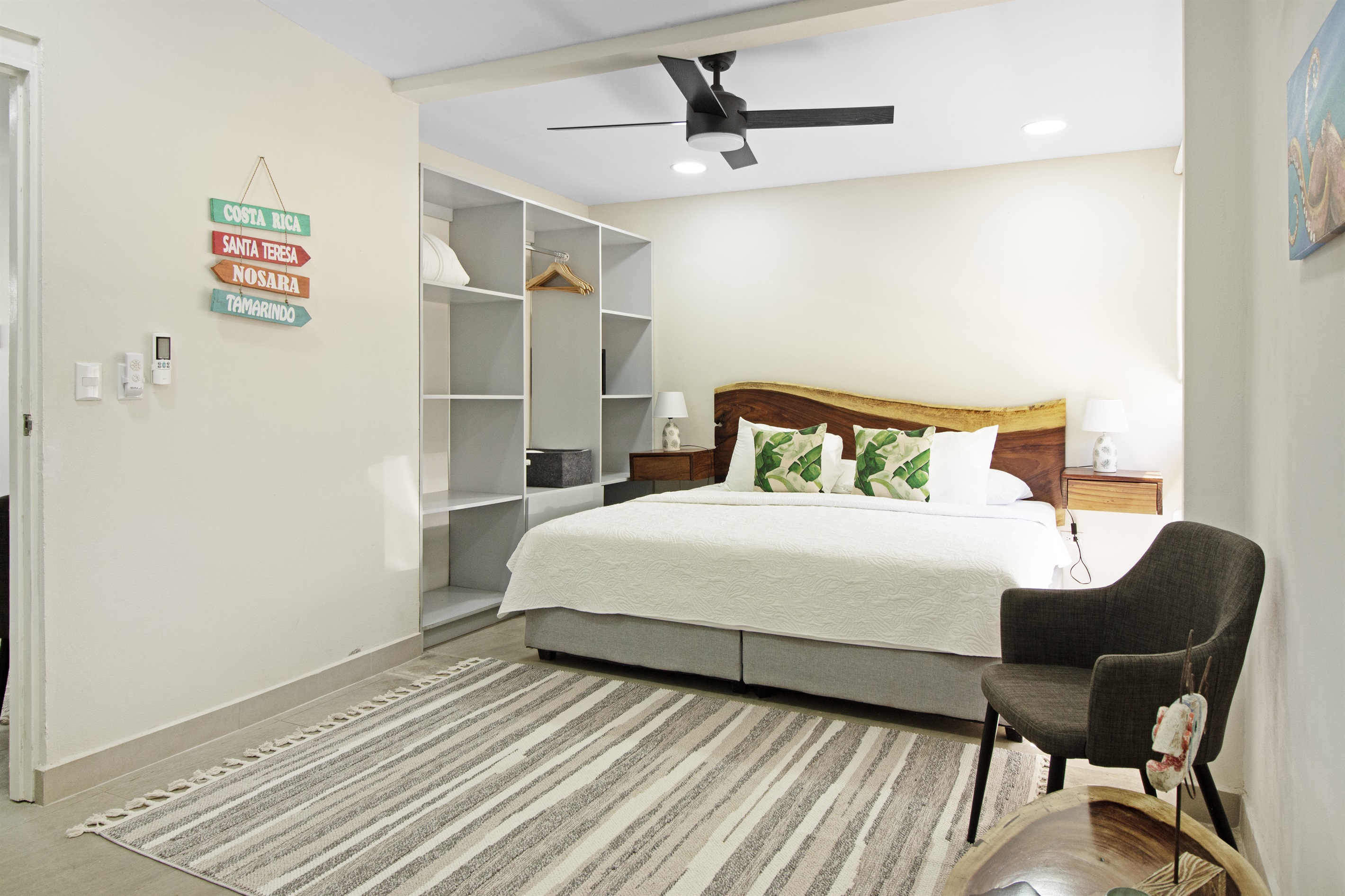 Master bedroom with a king size bed, ensuite bathroom and ample closet space. Choose between air conditioning or ceiling fan for a more natural breeze.