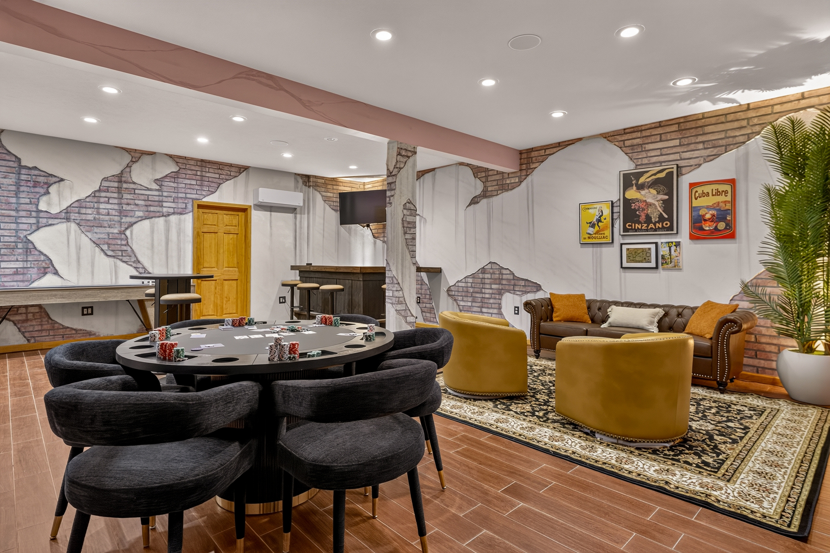 Poker table and lounge seating in entertainment area