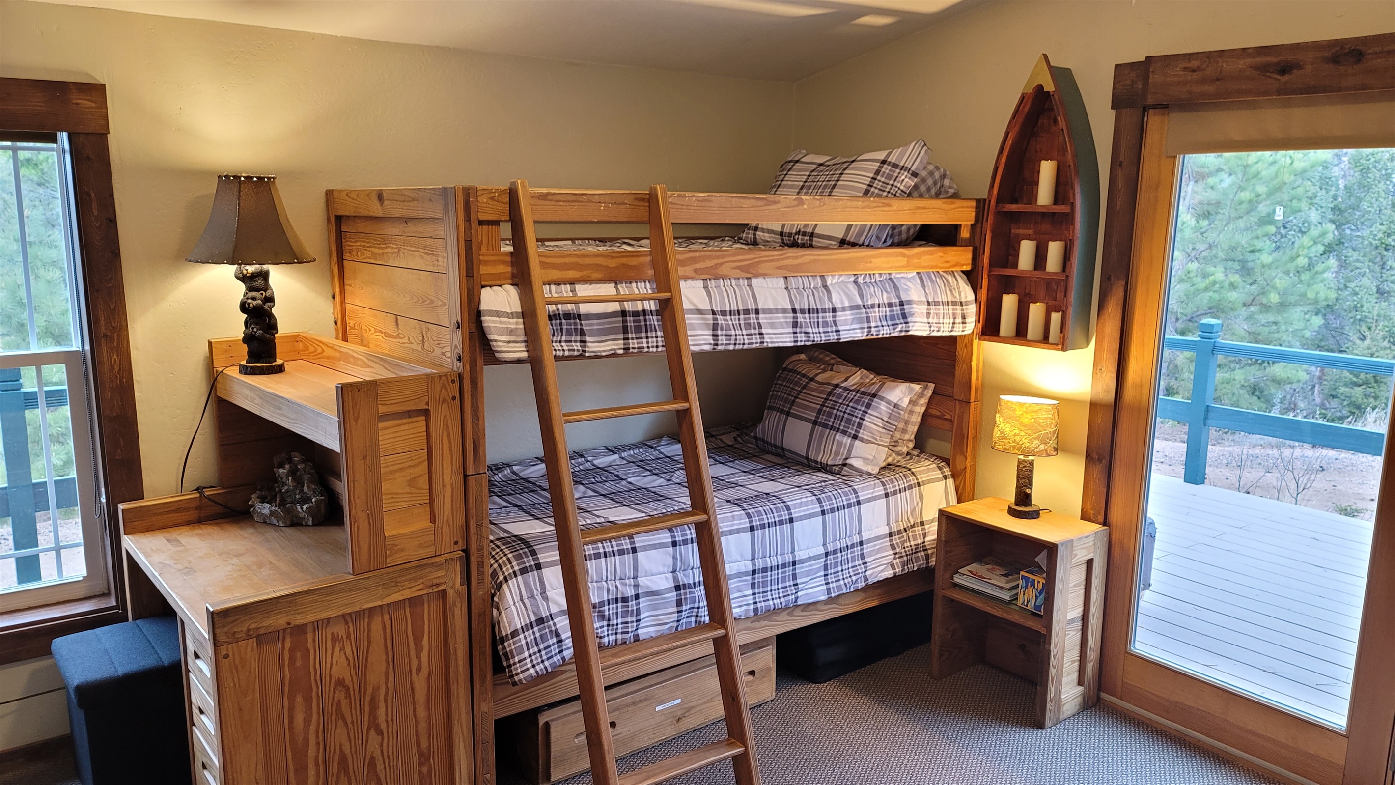 Bunk Bedroom, set up for kids with a stocked toy box, DVDs and VHS kids movies and a TV to play them on.
