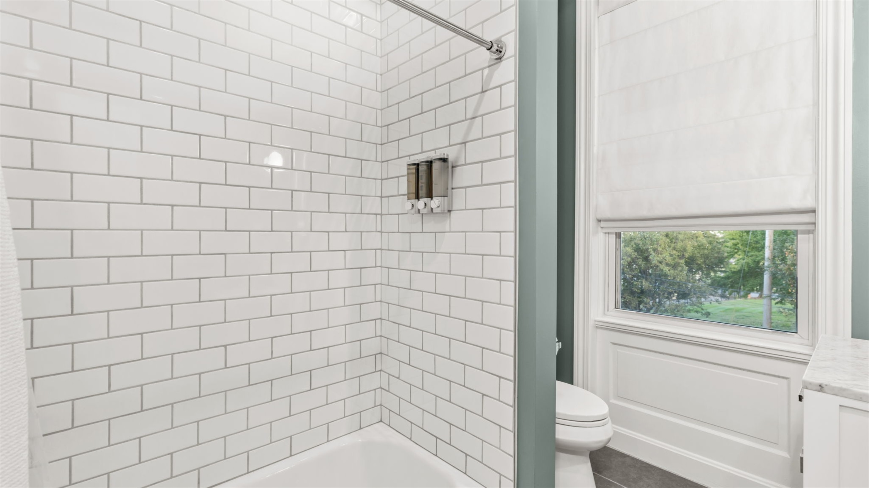 Shared bathroom upstairs provides shower over tub access with spa-like body wash, shampoo, and conditioner to help you relax after a long day or infuse you with energy for the day to come!