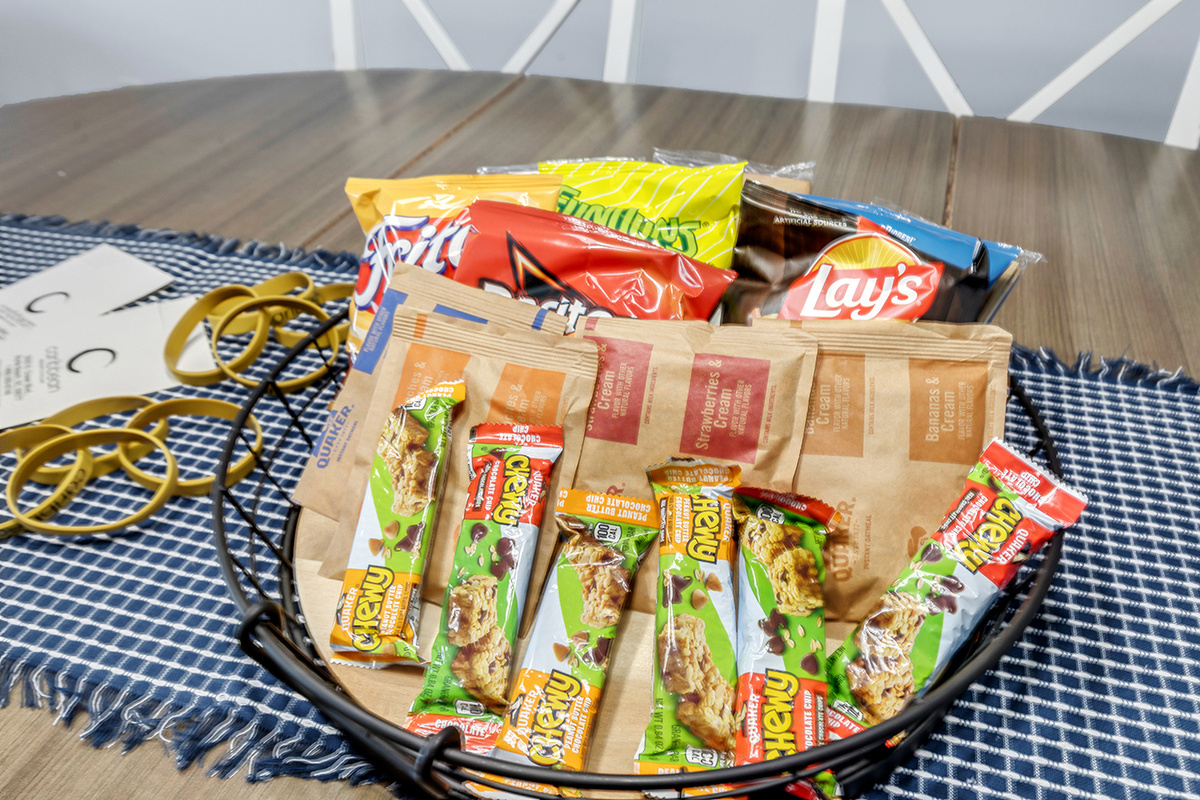 Enjoy a snack when you arrive. Parking passes and pool bands provided. 