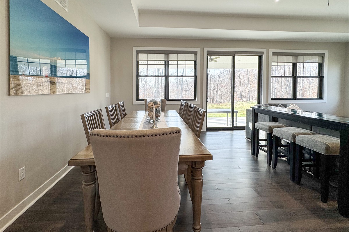 Large dining table for gathering with family and friends.