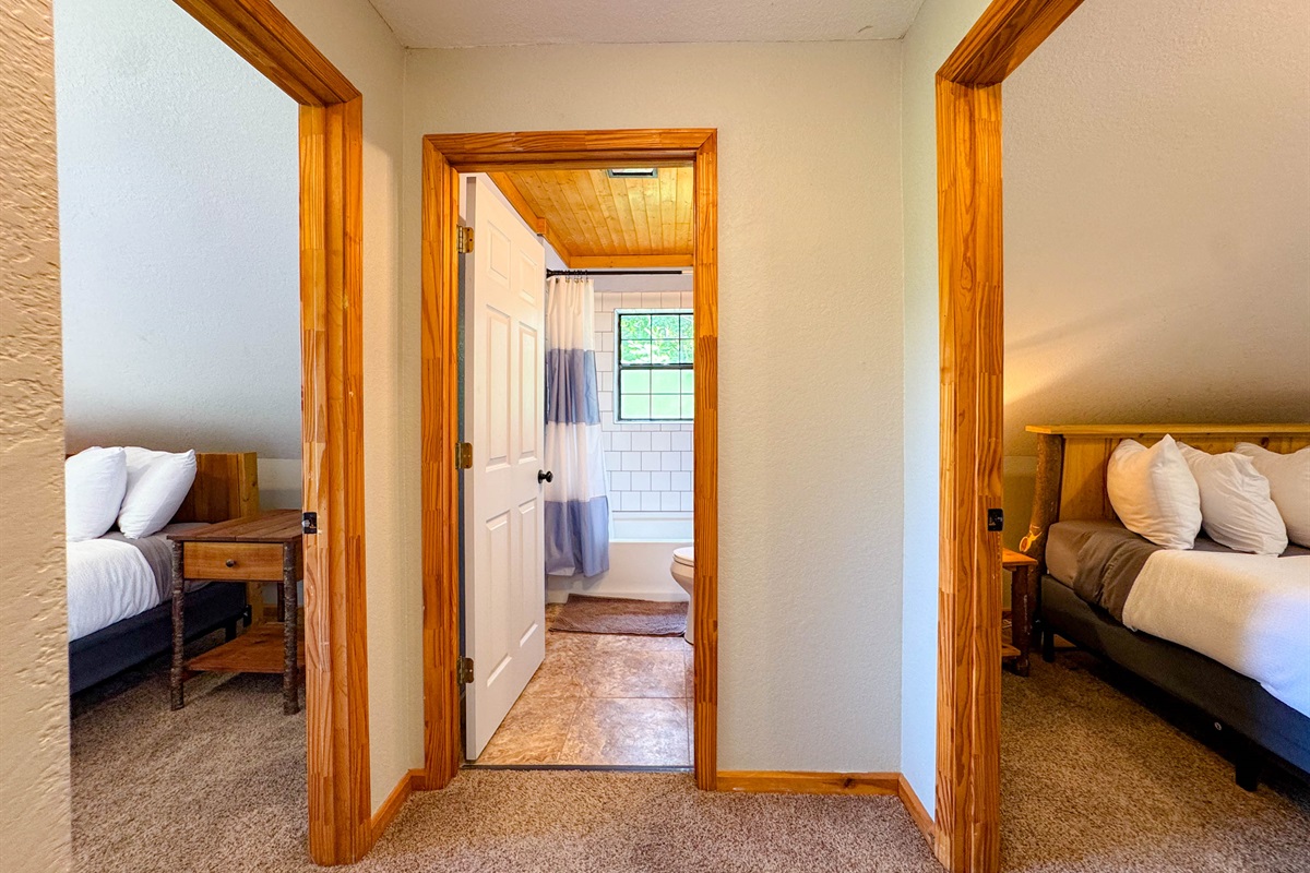 The upper level bathroom is directly between the two upstairs bedrooms. Perfect for sharing.