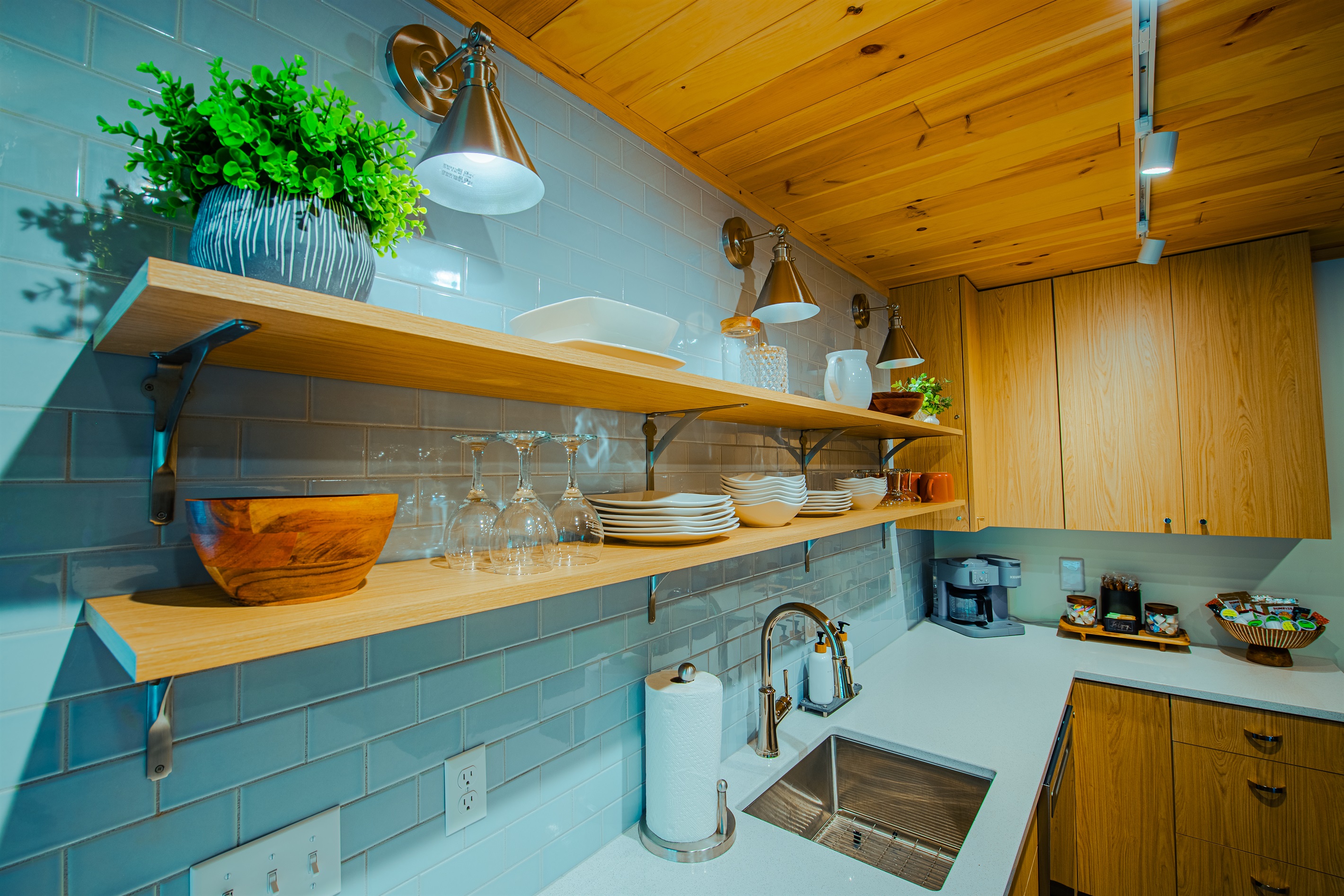 Kitchen - paper towels, dish soap and sponge, dishwasher pods, food storage bags and wrap provided.