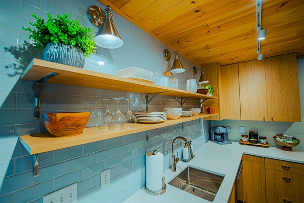 Kitchen - paper towels, dish soap and sponge, dishwasher pods, food storage bags and wrap provided.