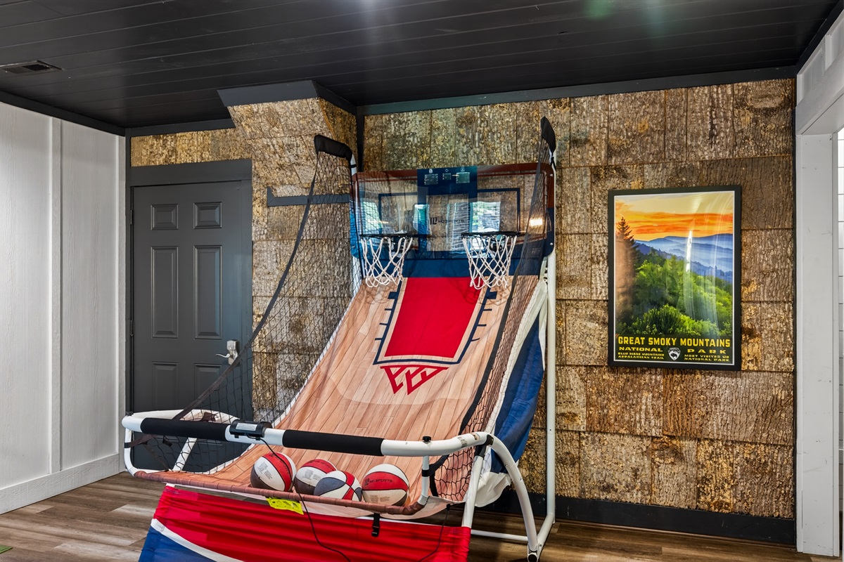 Basketball game in downstairs game room.