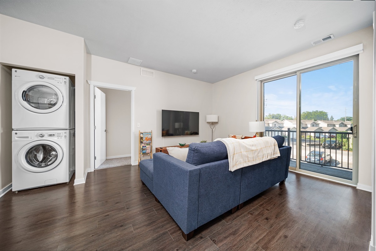 Living room with large couch and TV