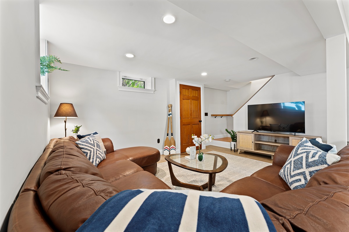 A comfortable space downstairs, perfect for gathering and making memories.