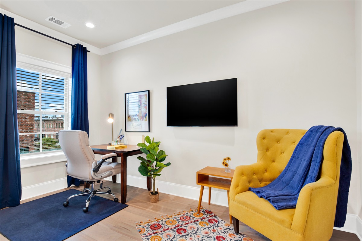 Primary King size bedroom with office space and lounging