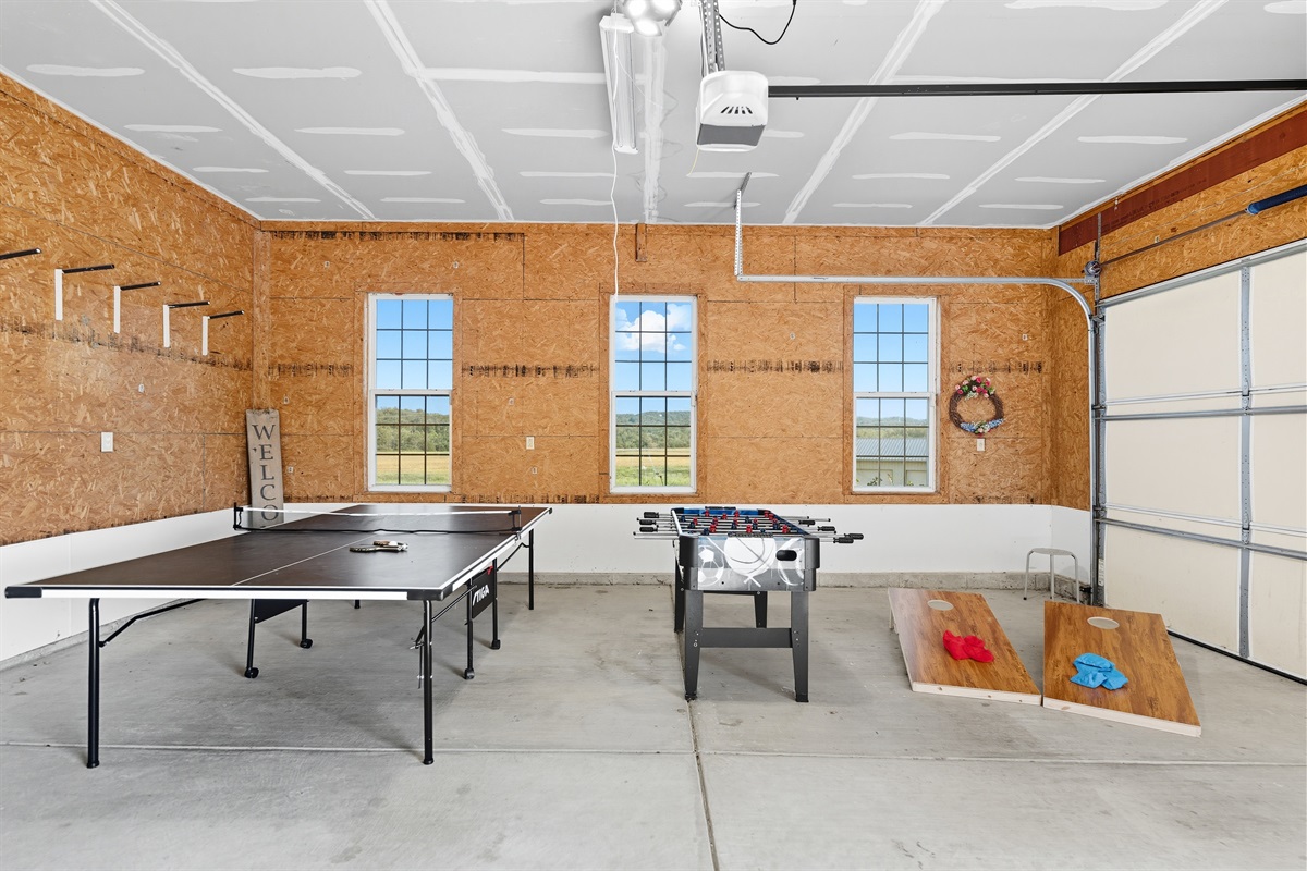 Game time in the garage! Ping pong, foosball, and room to play for guests of all ages.