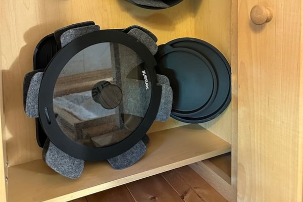 Fully stocked kitchen with everything you need—cookware, utensils, dishware, and coffee maker. Compact yet efficient, ready for cooking meals or enjoying takeout with ease.