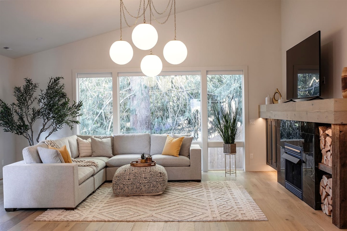 This is the living room area, featuring a 75-inch smart TV.