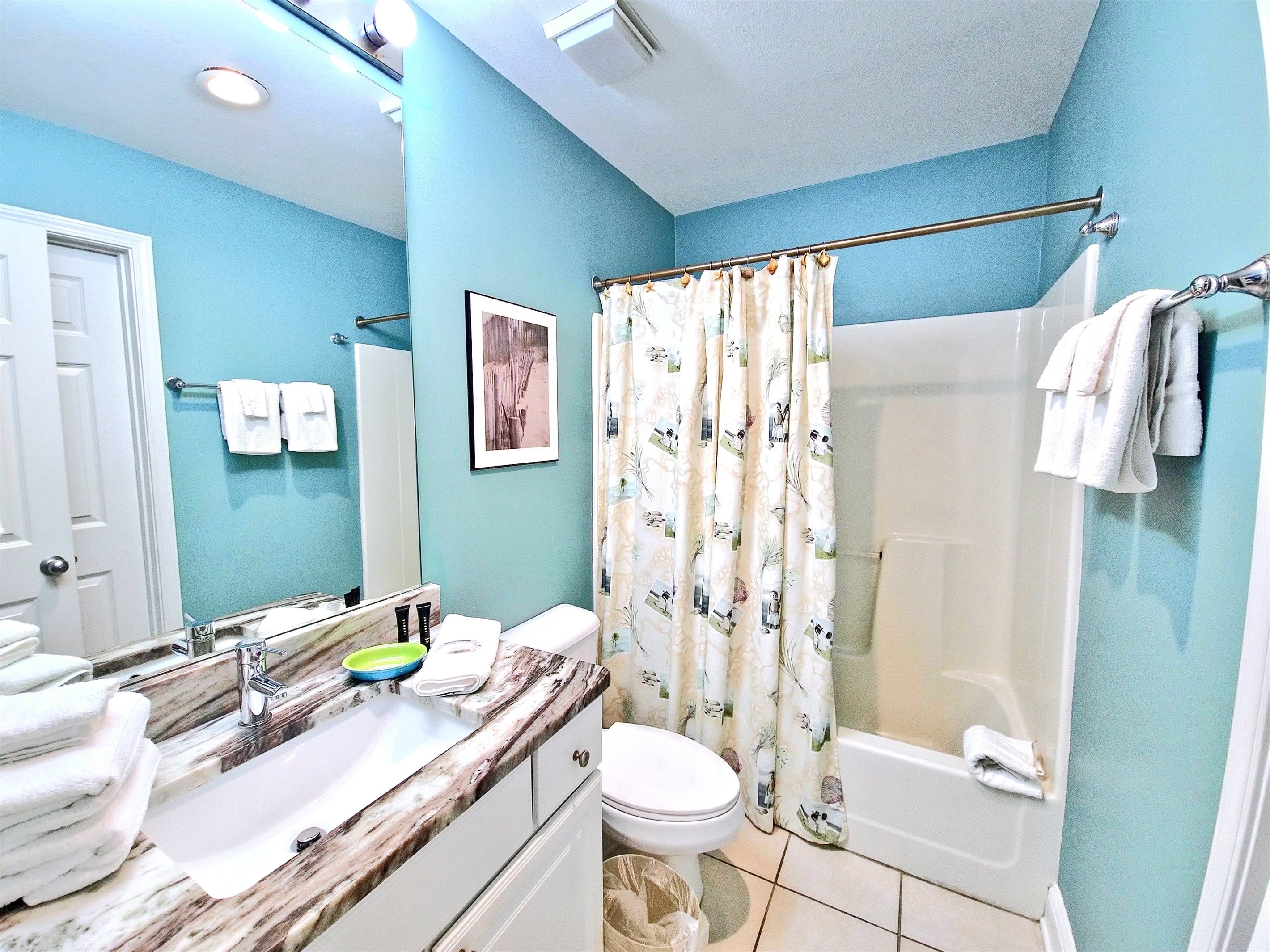 second bathroom with tub/shower combo