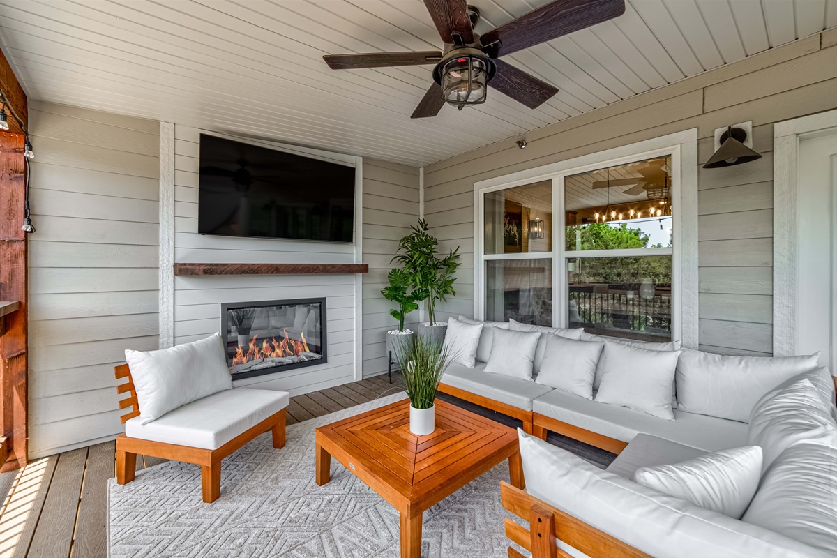 Outdoor fireplace and fans will keep you comfortable in most weather