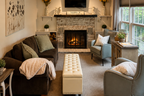 Cozy living room with wooded view