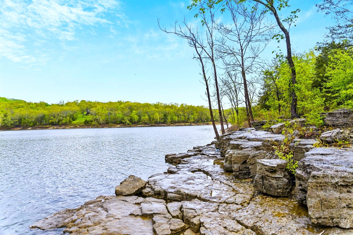 Grand Rock Formations Creating a Dramatic Landscape at the Lake's Edge