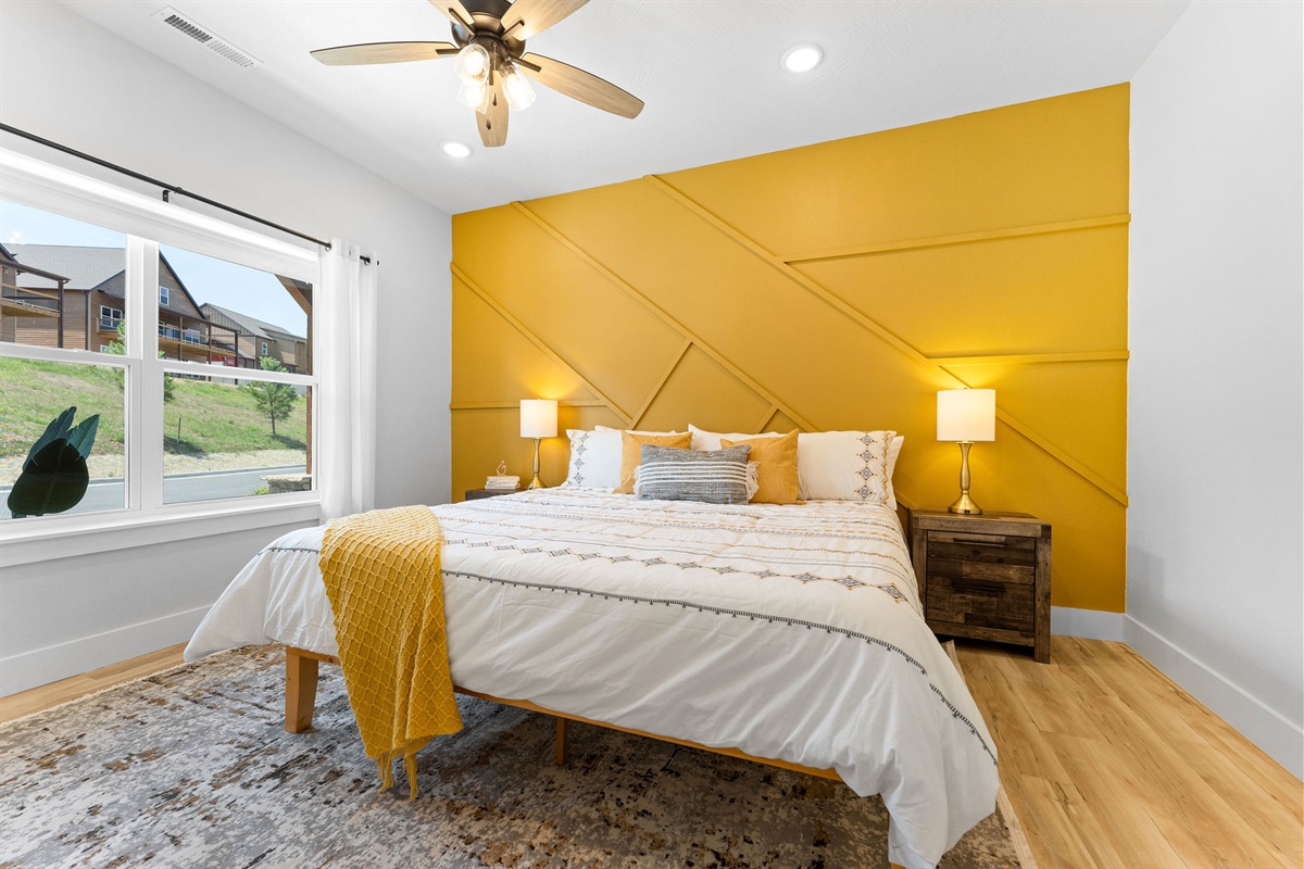 Main level king bedroom w/ ensuite bath