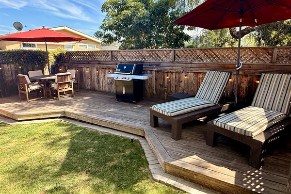Outdoor deck includes BBQ with tools, 2 chaise lounge chairs, a dining table with 4 chairs, and 2 camping rocker chairs (stored in garage).