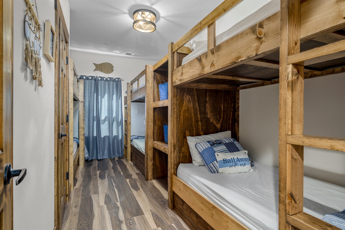 Lower level: Avonlea School bunkroom with 6 twin beds and ensuite bathroom