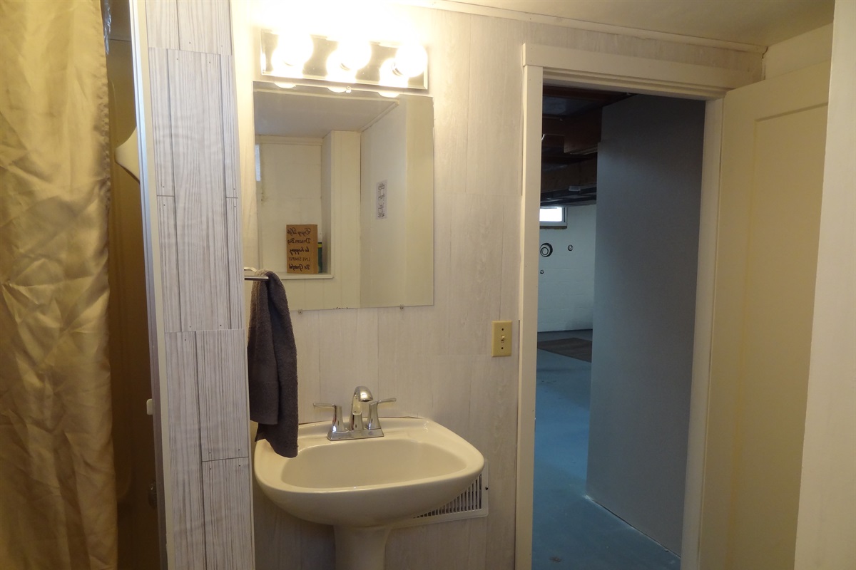 Basement bathroom with tub/shower