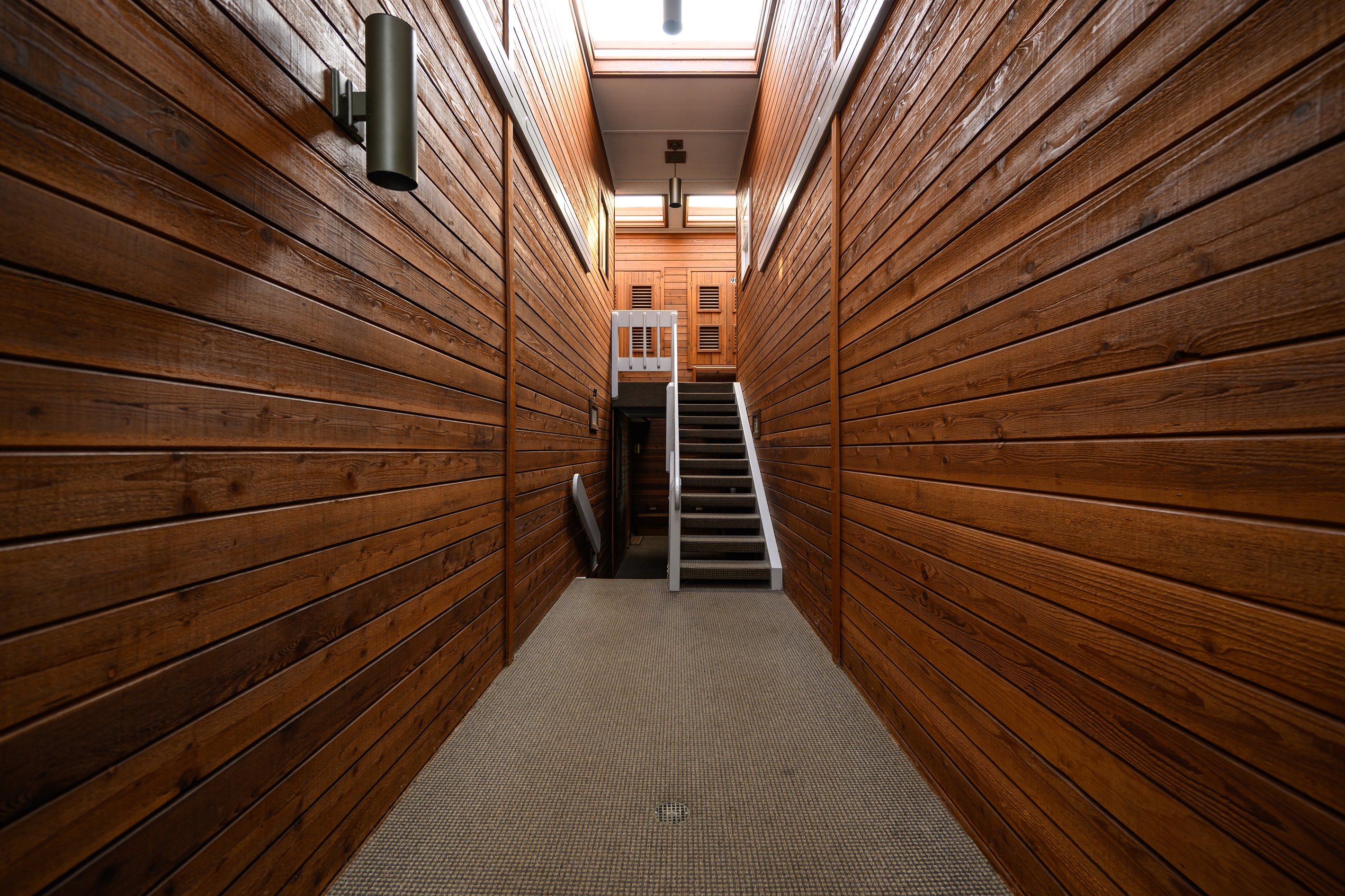Shared entry and walk way to our unit, there are a few steps down
