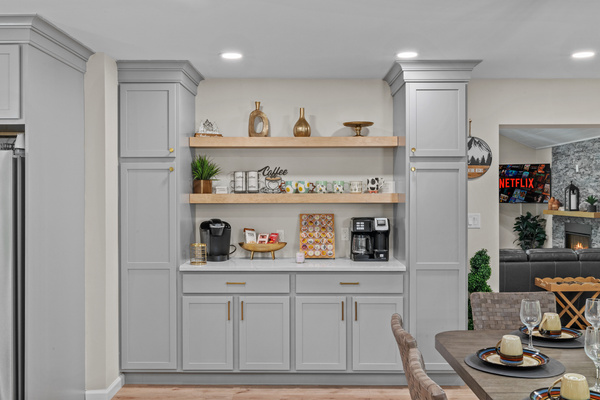 A coffee station featuring a clean, contemporary look that adds a modern touch to the kitchen