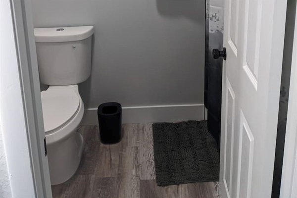 Master bathroom shower and toilet room with locking door, attached to master bedroom