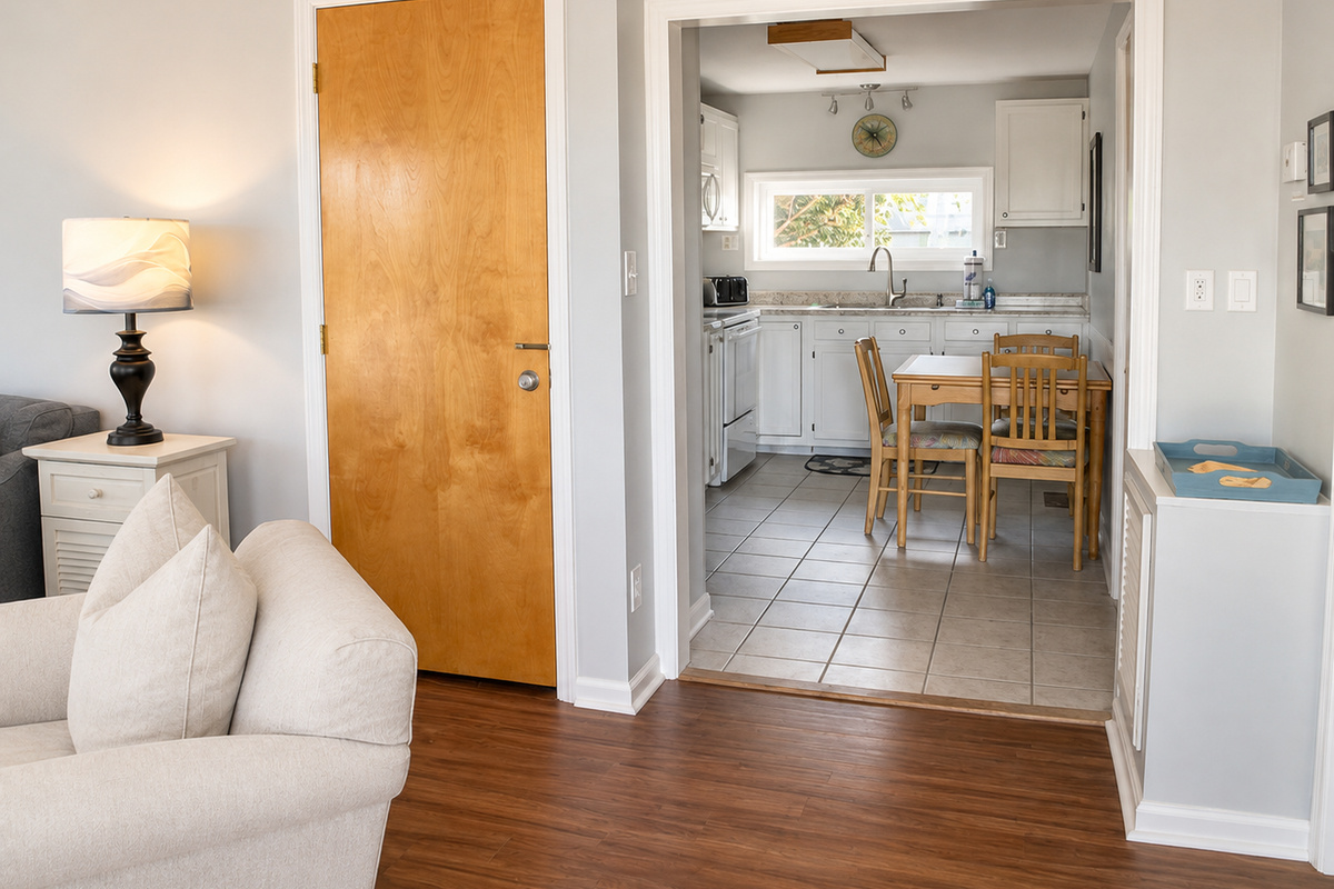 From the front entry - bedroom 1 to the right, living to the left. Kitchen ahead