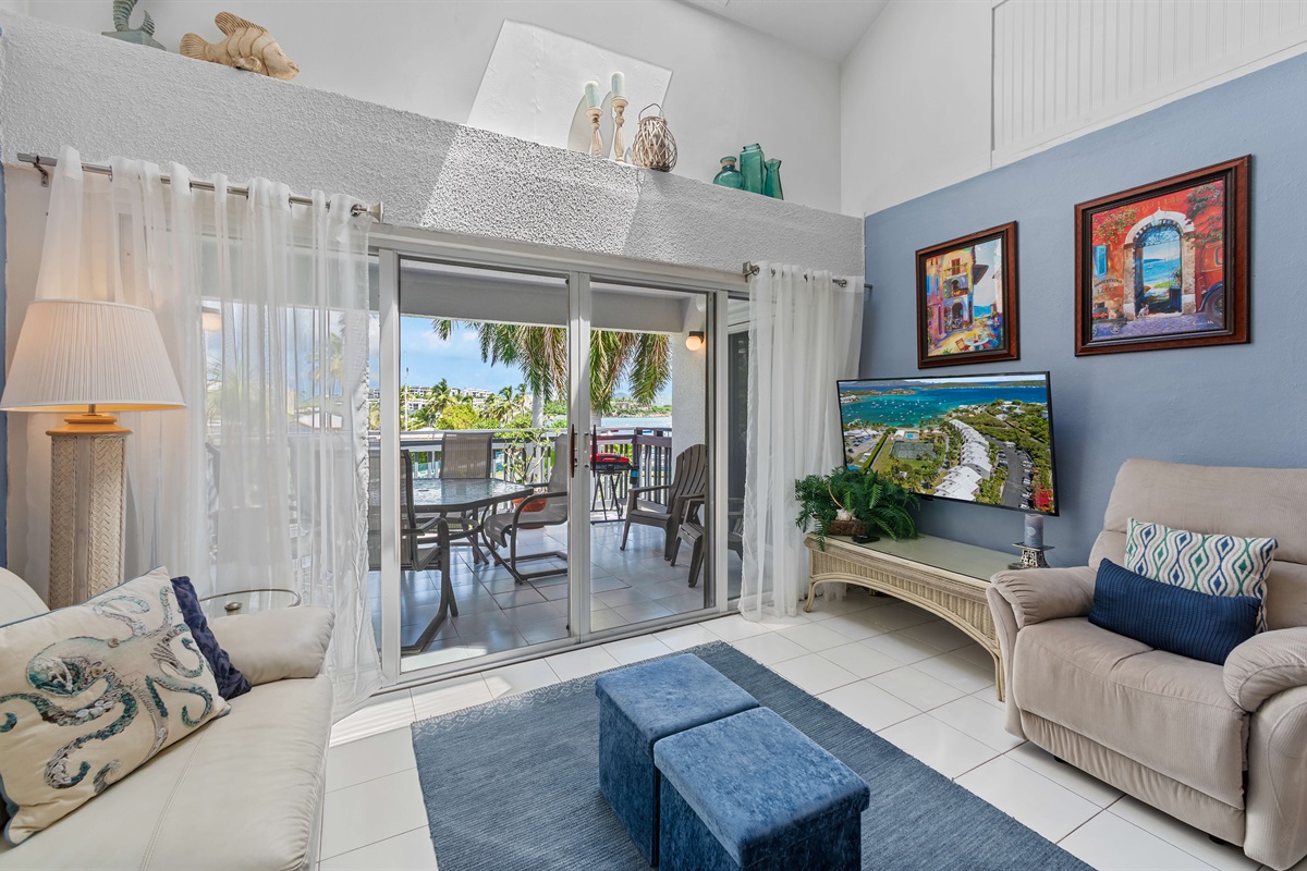 Sliding glass doors lead to a parch right off of the living room