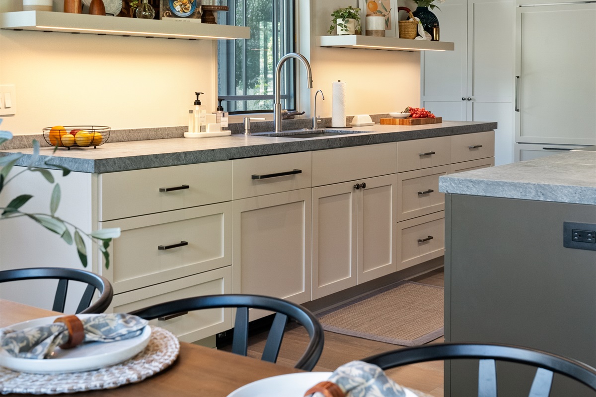 Chef-inspired kitchen with large sink and integrated dishwasher
