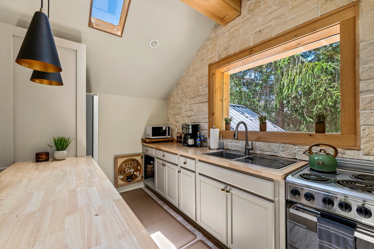 The Penthouse: Fully Stocked Kitchen.