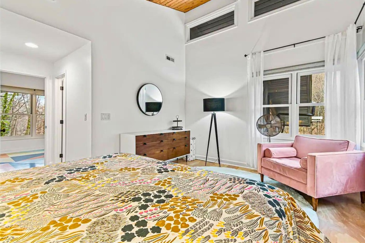 Cozy Seating and Vaulted Ceilings in the Upstairs Bedroom