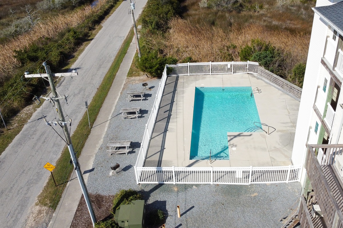 Outdoor pool with fenced deck